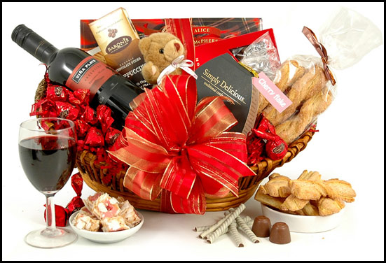 Anniversary gift hamper - Consist of wine, goodies, soft toys and chocolates
